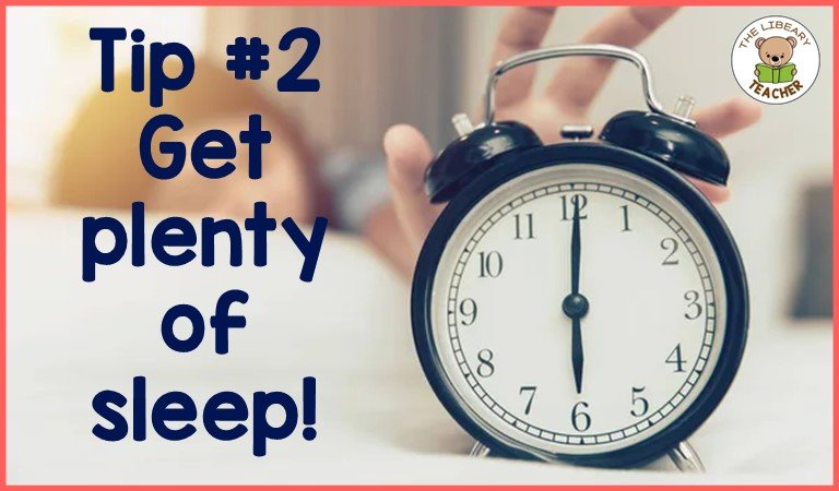 adult reaching to turn off alarm clock